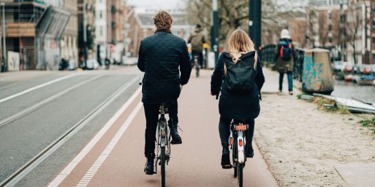 Two cyclists in the Netherlands.