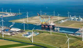 Wind turbines in a port area.