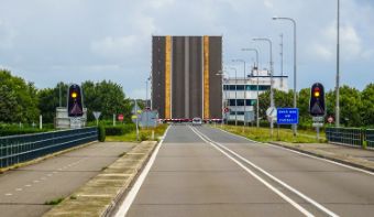 A photo of a bridge. The bridge is opened.